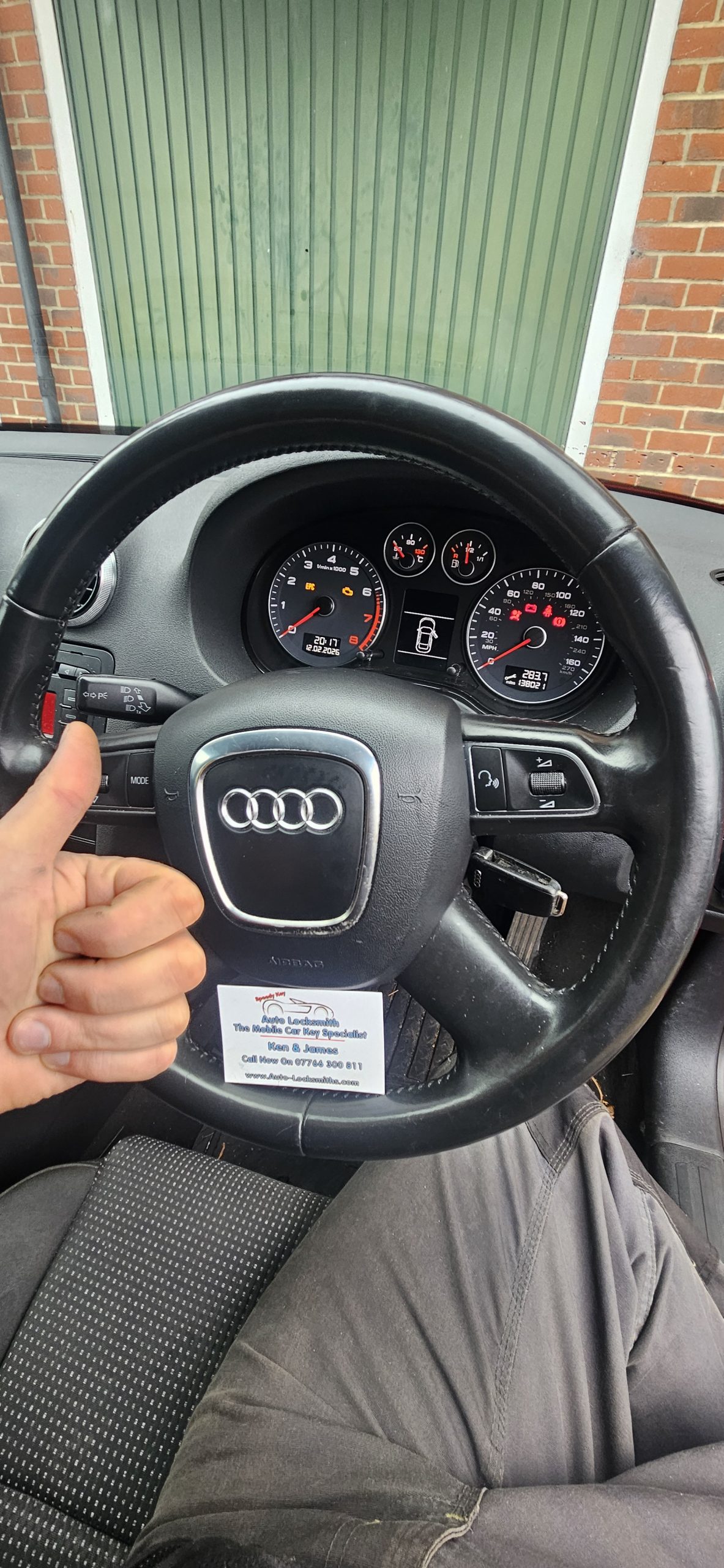 thumbs up from auto locksmith after cutting keys for audi car. 